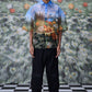 Stylera oversized floral button up shirt with vibrant flower print worn by male model