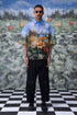 Stylera oversized floral button up shirt with vibrant flower print worn by male model