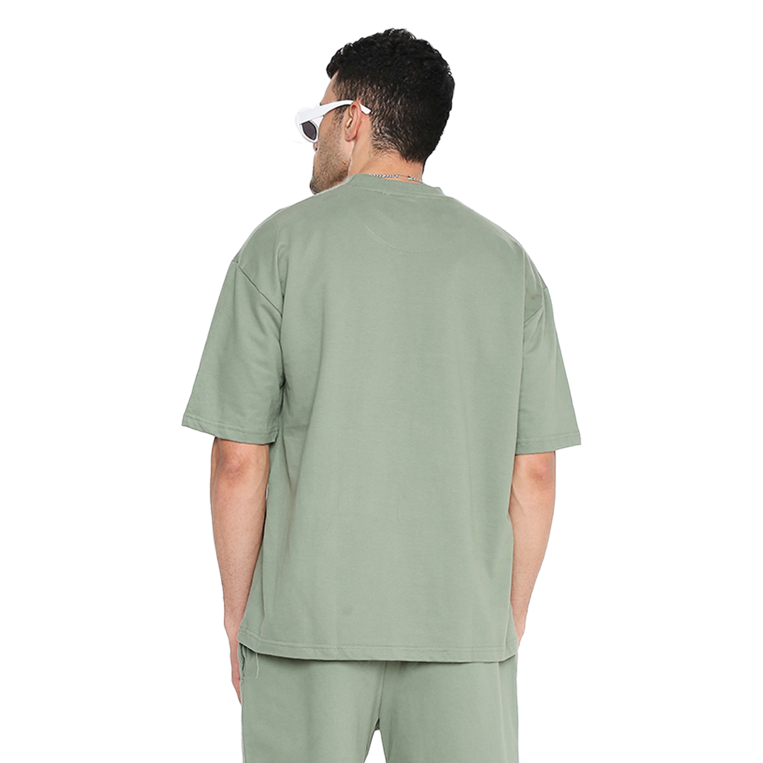 Stylera oversized green t-shirt back view on male model relaxed fit short sleeves casual cotton loungewear