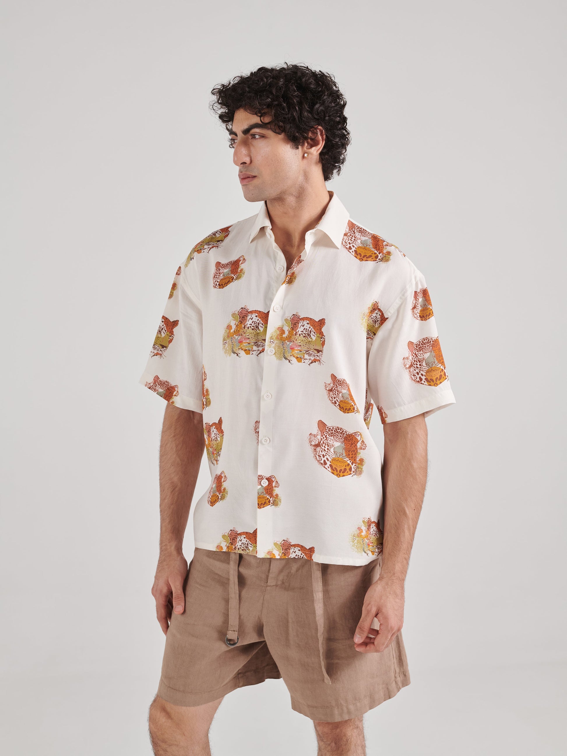 Stylish oversized leopard shirt for men featuring a unique floral print in vibrant colors