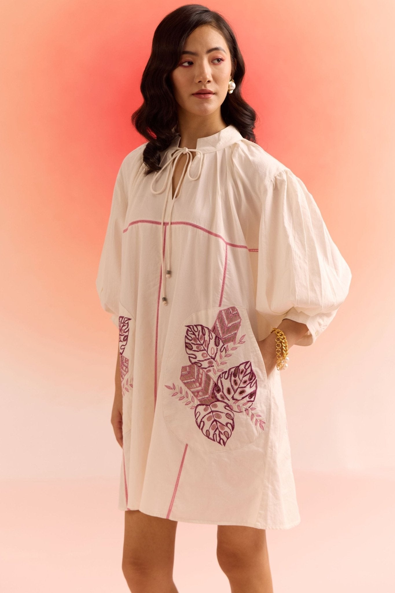 Stylera oversized off white dress with puffed sleeves and purple leaf print design