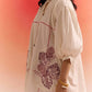 Stylera oversized off white dress with balloon sleeves and leaf print details
