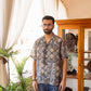 Stylish oversized printed shirt for men featuring a unique pattern, perfect for casual outfits.