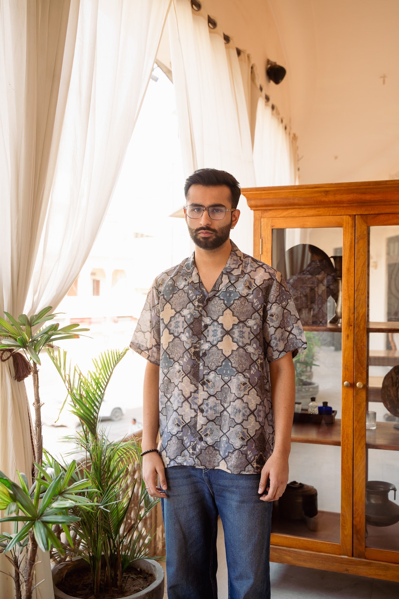 Stylish oversized printed shirt for men featuring a unique pattern, perfect for casual outfits.