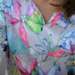 Pastel floral satin pajama set with vibrant prints and stylish, comfortable design by Stylera