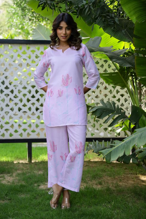 Stylish pastel pink cotton co-ord set featuring floral prints and comfortable fit for casual wear