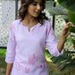 Pastel pink cotton co-ord set featuring floral embroidery for a stylish look