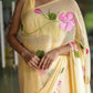 Pastel yellow floral saree for women with pink flower embroidery for elegant occasions