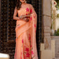 Stylera peach chiffon saree with floral design elegantly draped for special occasions