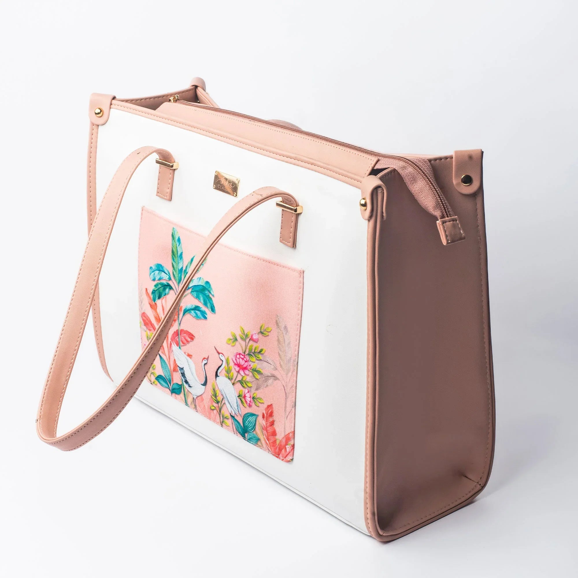 Peach crane paradise tote bag with colorful tropical design and adjustable shoulder strap