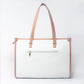 Stylish peach crane paradise tote bag with dual handles and a zippered back pocket for convenience
