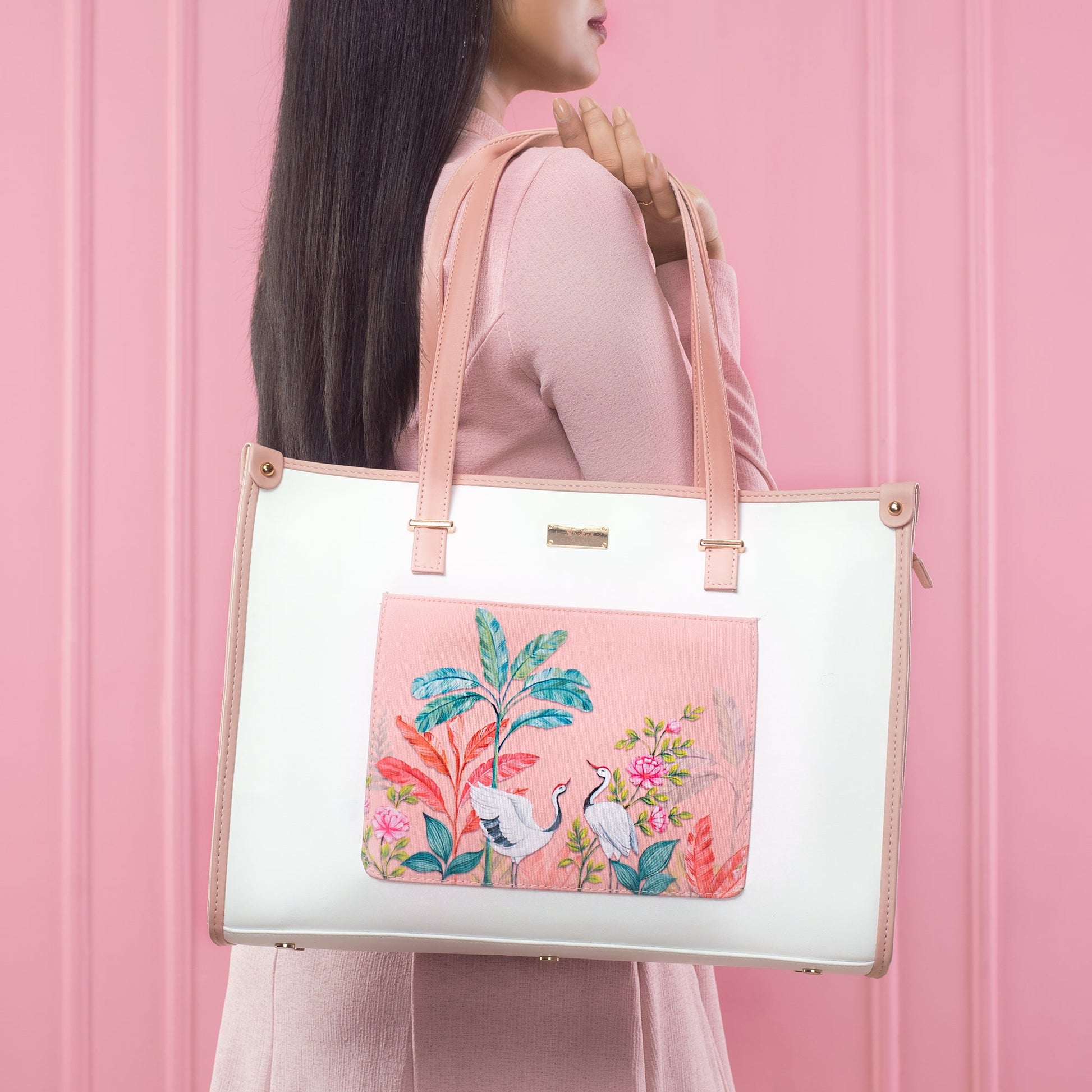 Peach crane paradise tote bag featuring vibrant floral and crane designs, perfect for stylish outings.