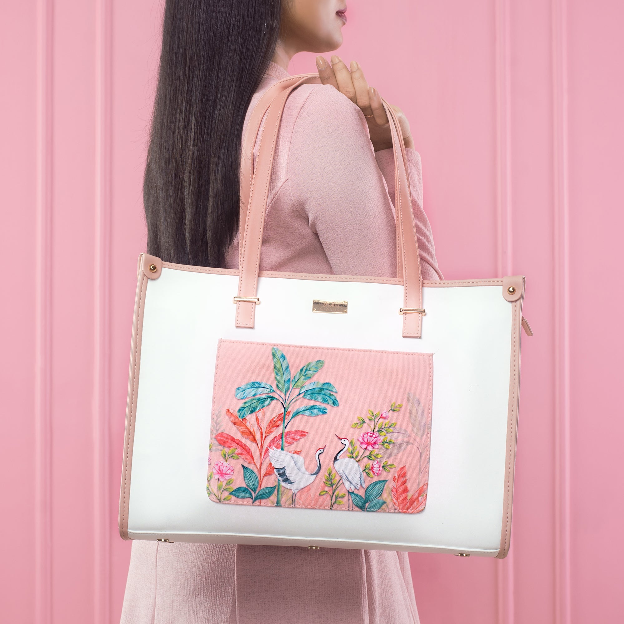 Peach crane paradise tote bag featuring vibrant floral and crane designs, perfect for stylish outings.