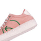 Stylish pink casual sneakers for women with green logo detailing and a comfortable sole
