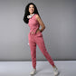 Model wearing a pink corset crop top with joggers, styled for a trendy look and comfort