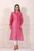 Elegant pink lehriya kurta for women featuring a button-down design and long sleeves