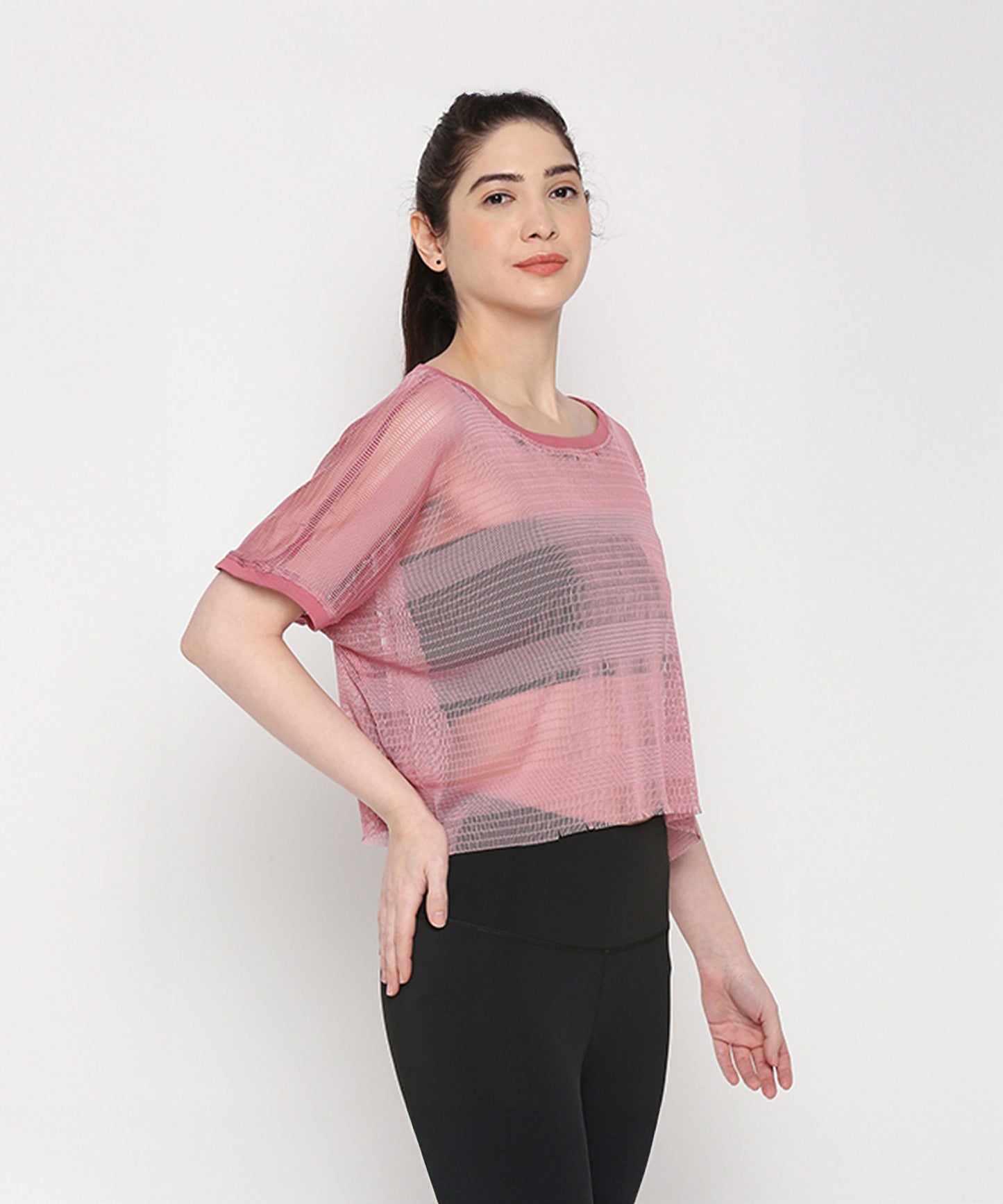 Stylera pink netted top for women with short sleeves and a stylish cropped design