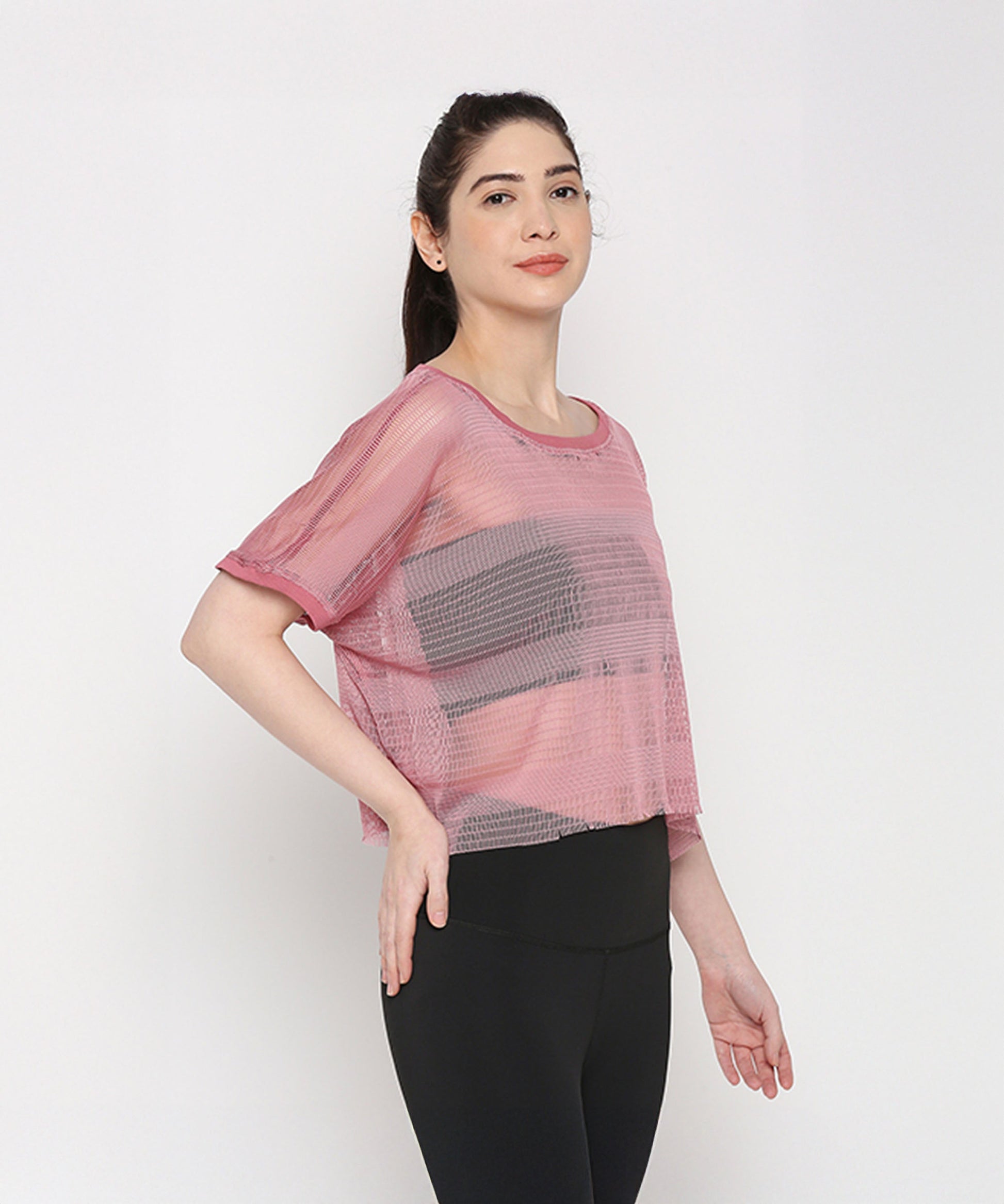 Stylera pink netted top for women with short sleeves and a stylish cropped design