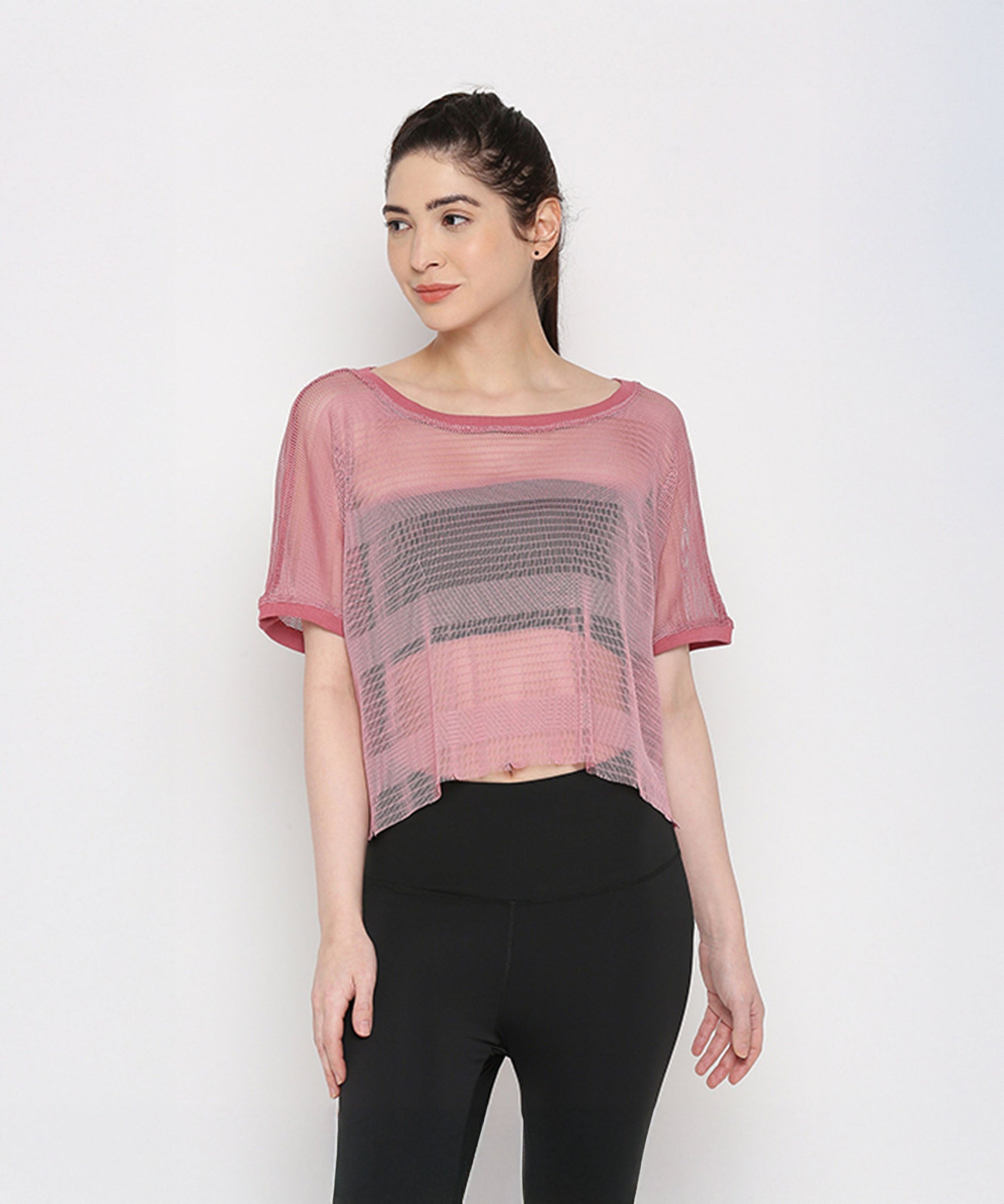 Stylish pink netted top for women with short sleeves and a relaxed fit, perfect for active wear