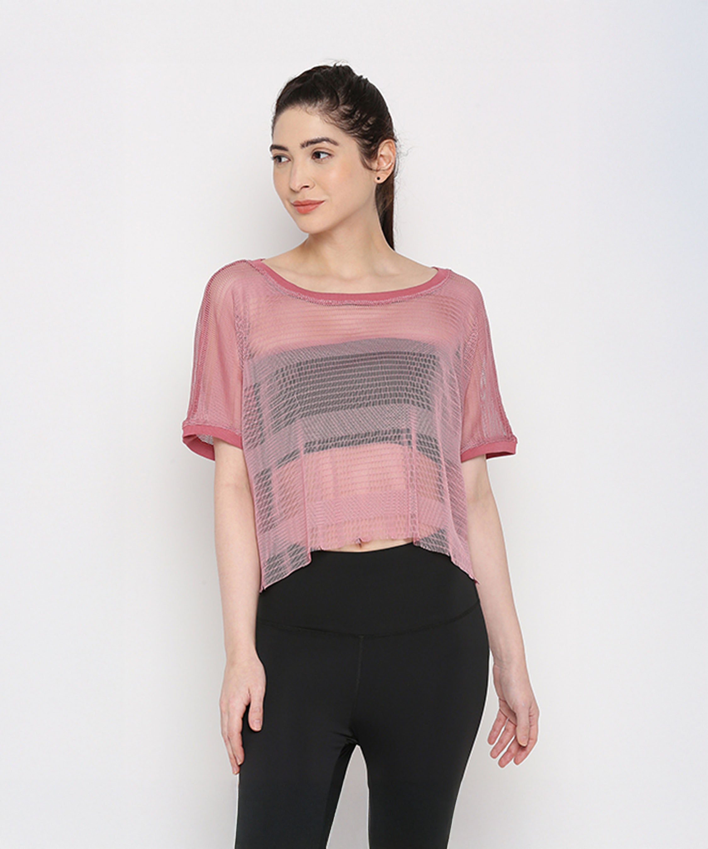 Stylish pink netted top for women with short sleeves and a relaxed fit, perfect for active wear