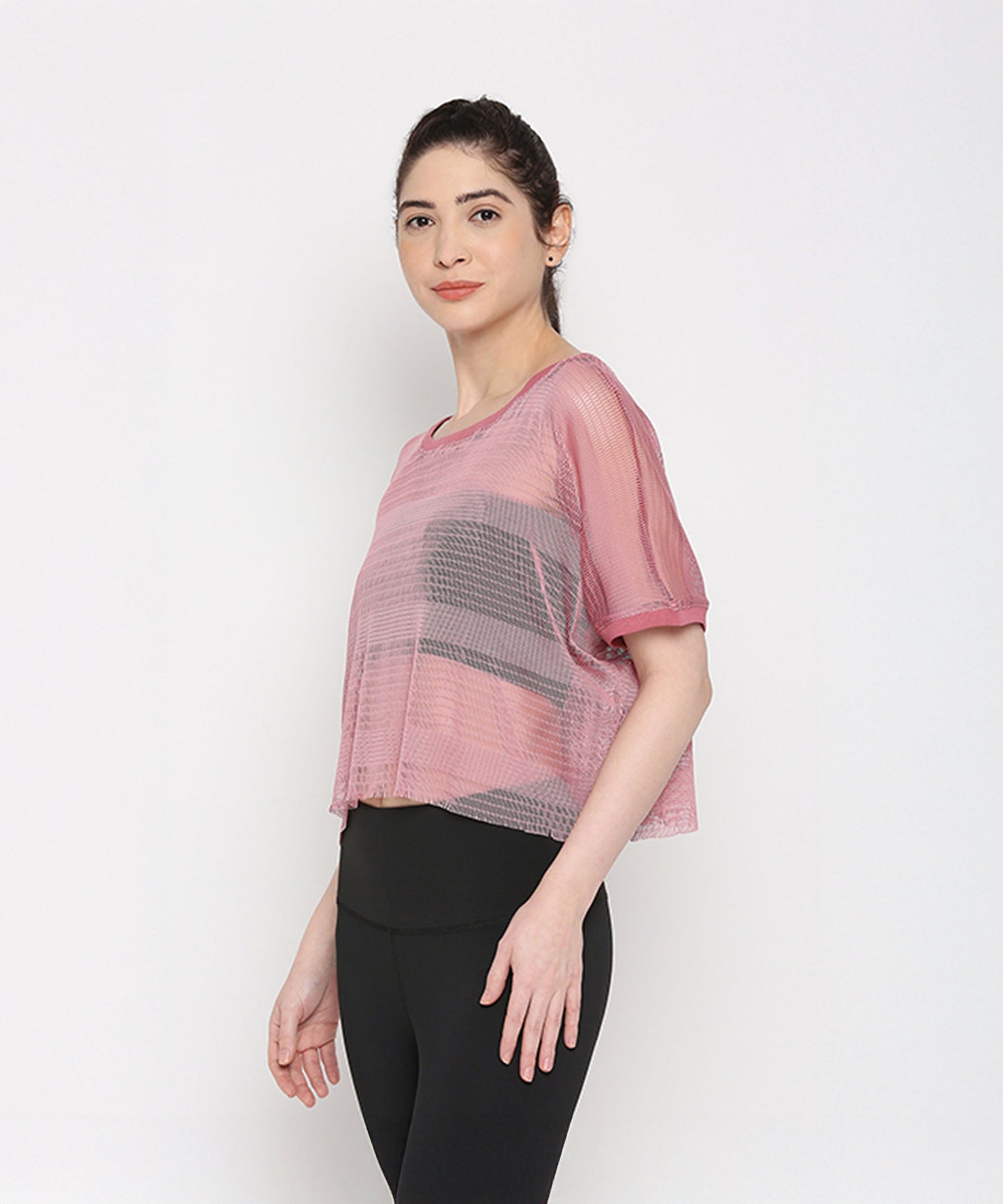 Pink netted top for women with short sleeves and a relaxed fit, perfect for casual wear