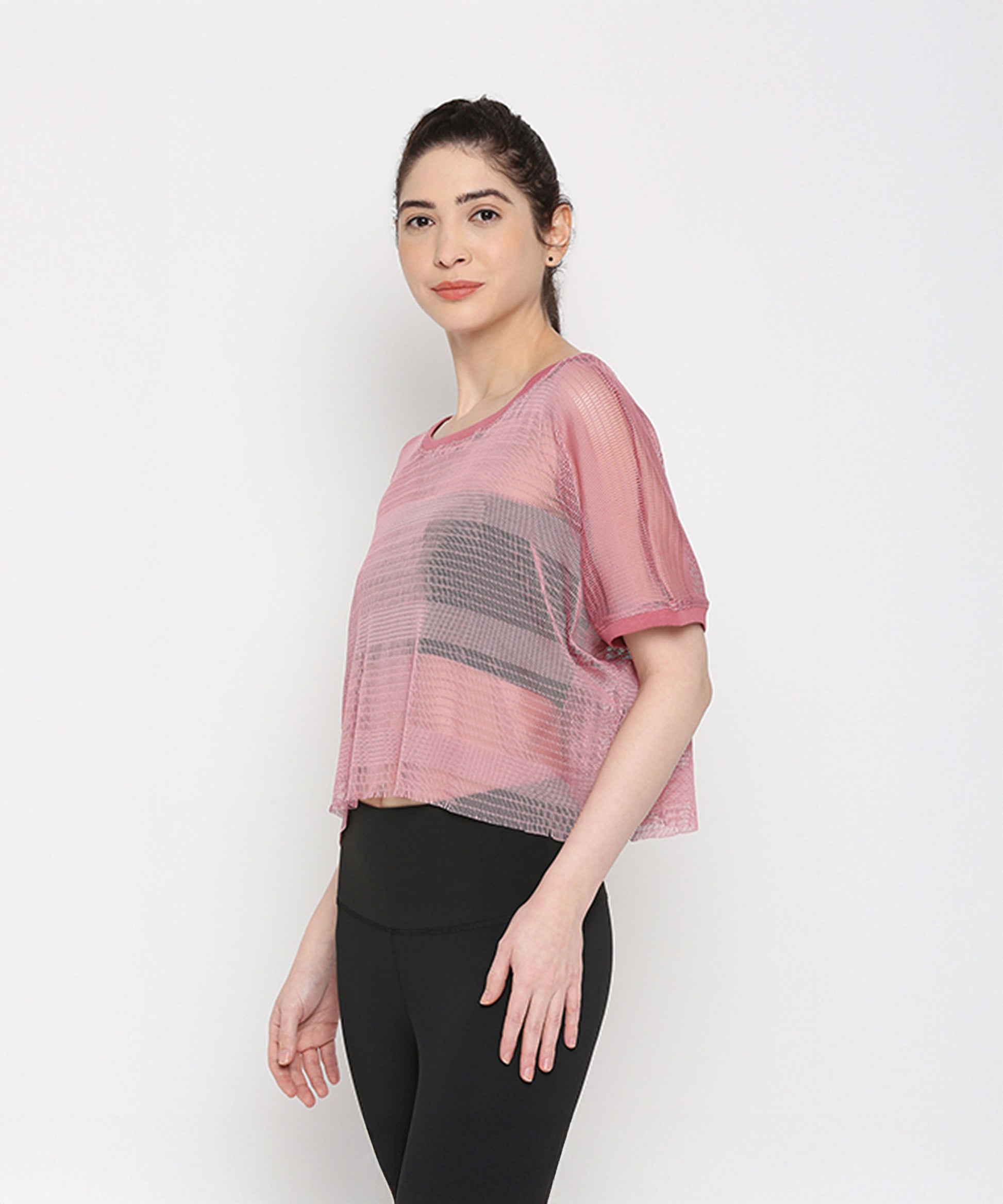 Pink netted top for women with short sleeves and a relaxed fit, perfect for casual wear