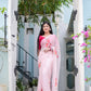 Elegant pink saree for women adorned with floral embroidery, perfect for festive occasions