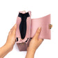 Inside view of a pink shoulder bag for women with a sleek design and spacious compartment