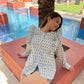 Stylera printed long sleeve shirt for women with ruffled sleeves in a stylish outdoor setting