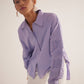 Stylera Era purple oversized cotton shirt with detailed sleeve design worn by model