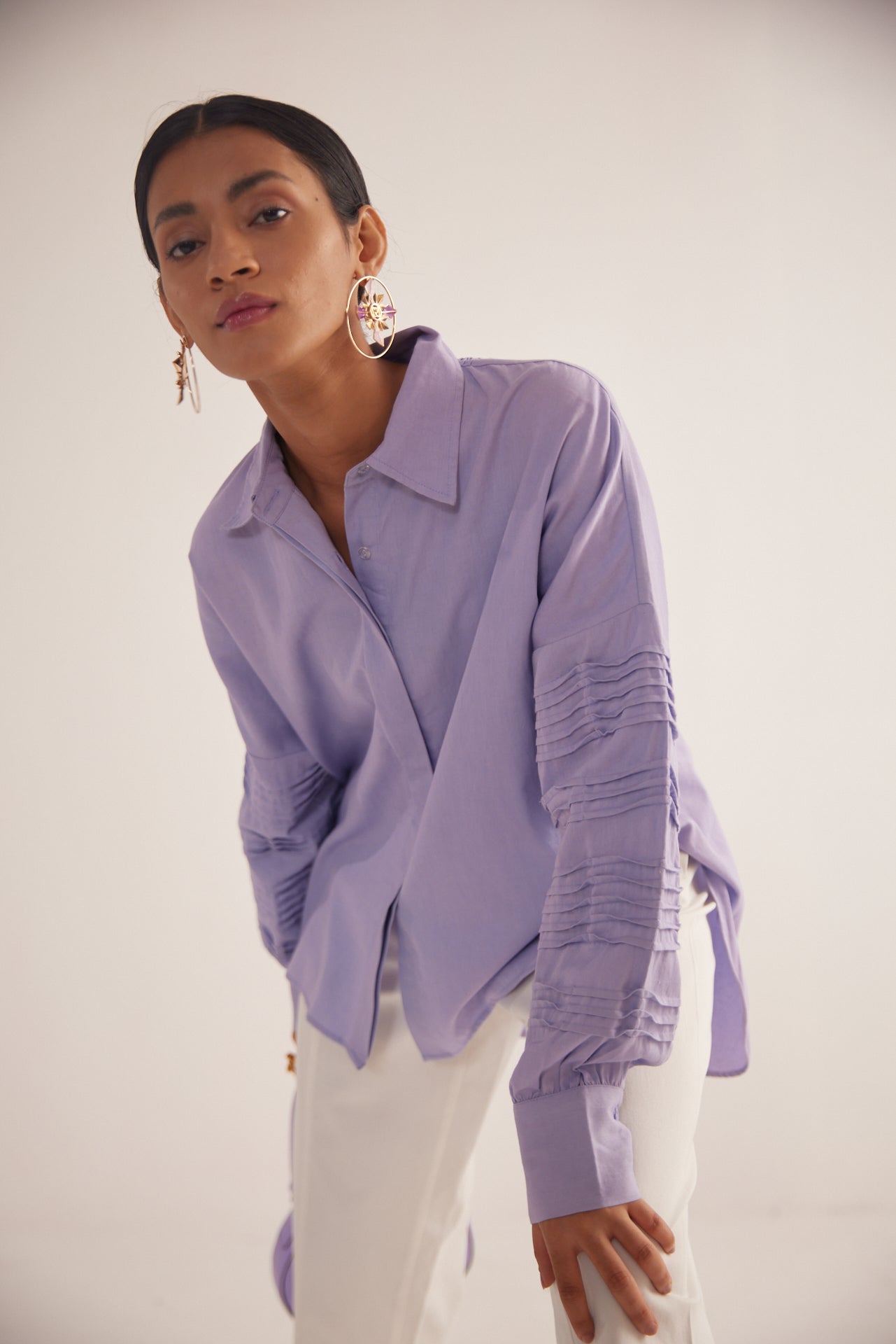 Stylera Era purple oversized cotton shirt with detailed sleeve design worn by model