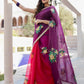 Elegant red and purple saree with handwork featuring floral designs, perfect for festive occasions.