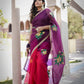 Elegant red and purple saree with handwork, featuring floral designs and a stylish drape for special occasions