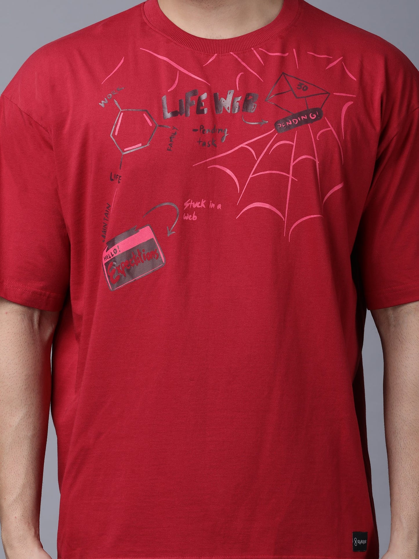 Red bold print casual tee for men featuring creative spider web design and unique graphics by Stylstpls
