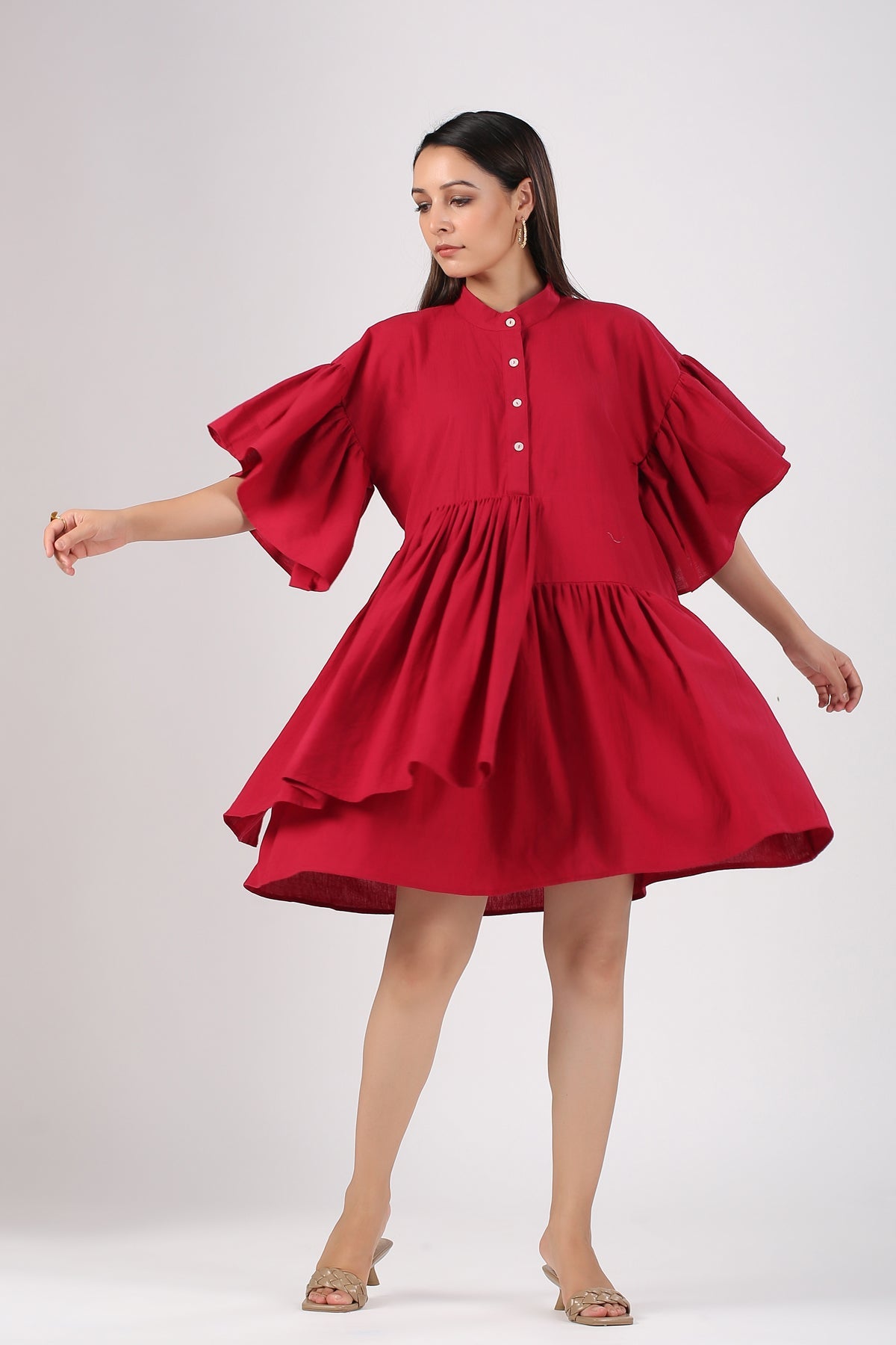 Red casual summer dress for women with puff sleeves and button details, perfect for warm weather outings