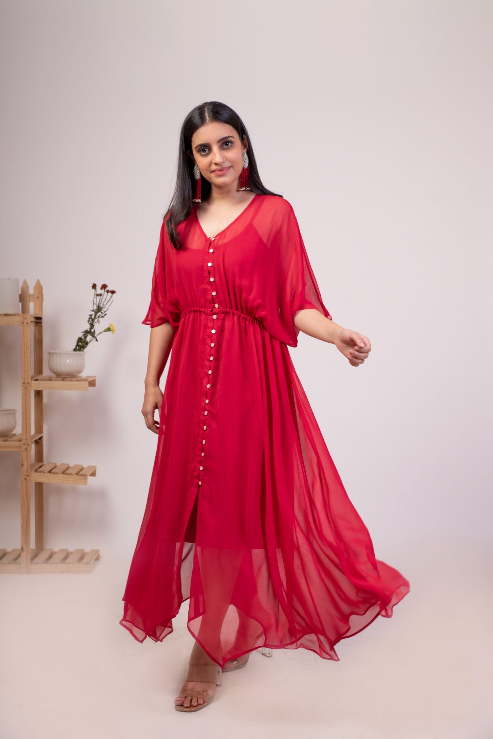 Elegant red flowy dress for women with button details and a relaxed fit, perfect for summer outings
