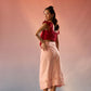 Stylera red top and skirt matching set with red sleeveless top and light pink skirt with cutout details