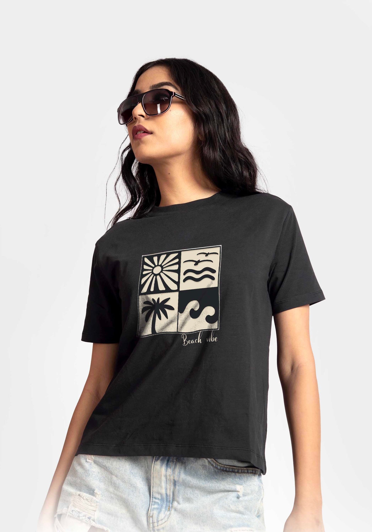 Regular fit black t-shirt for women by Stylera with beach-themed graphic print