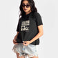 regular fit black t-shirt for women with graphic print worn with denim shorts bt Stylera