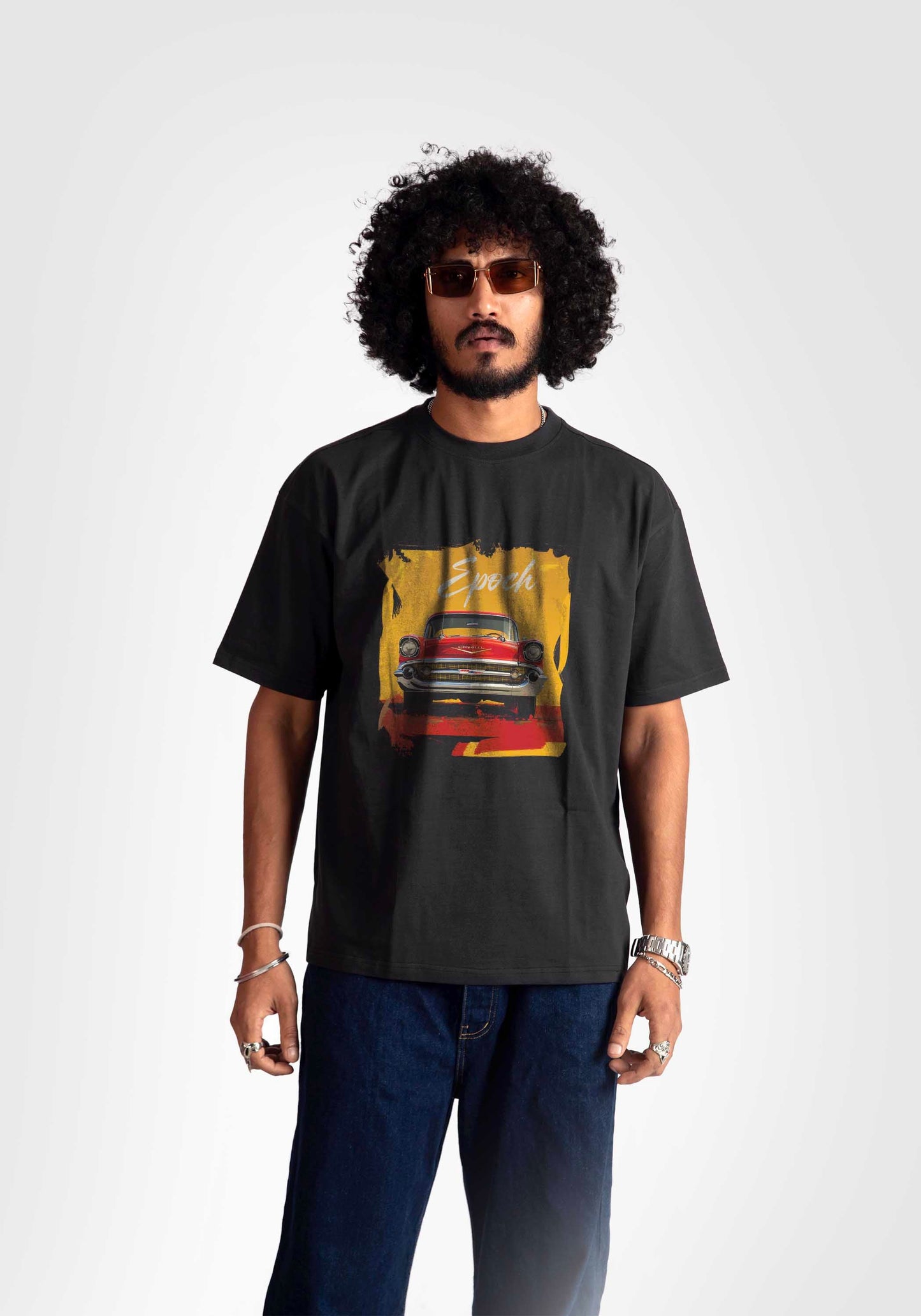 Stylera regular fit vintage car t-shirt in black worn by a man with curly hair and sunglasses