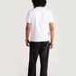Back view of a person wearing Stylera regular fit white tee paired with black pants