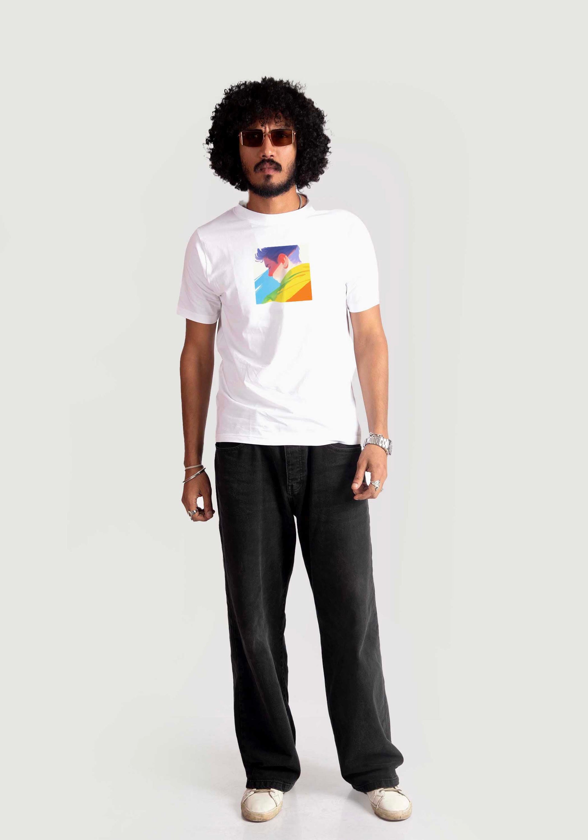 Man wearing Stylera regular fit white tee with colorful graphic and black pants