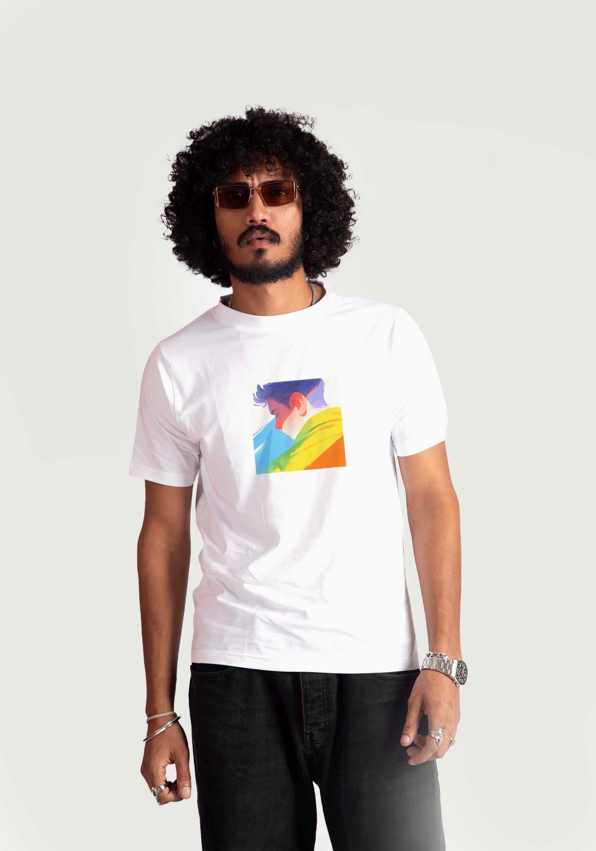 Stylera regular fit white tee with colorful graphic print worn by male model with curly hair and sunglasses