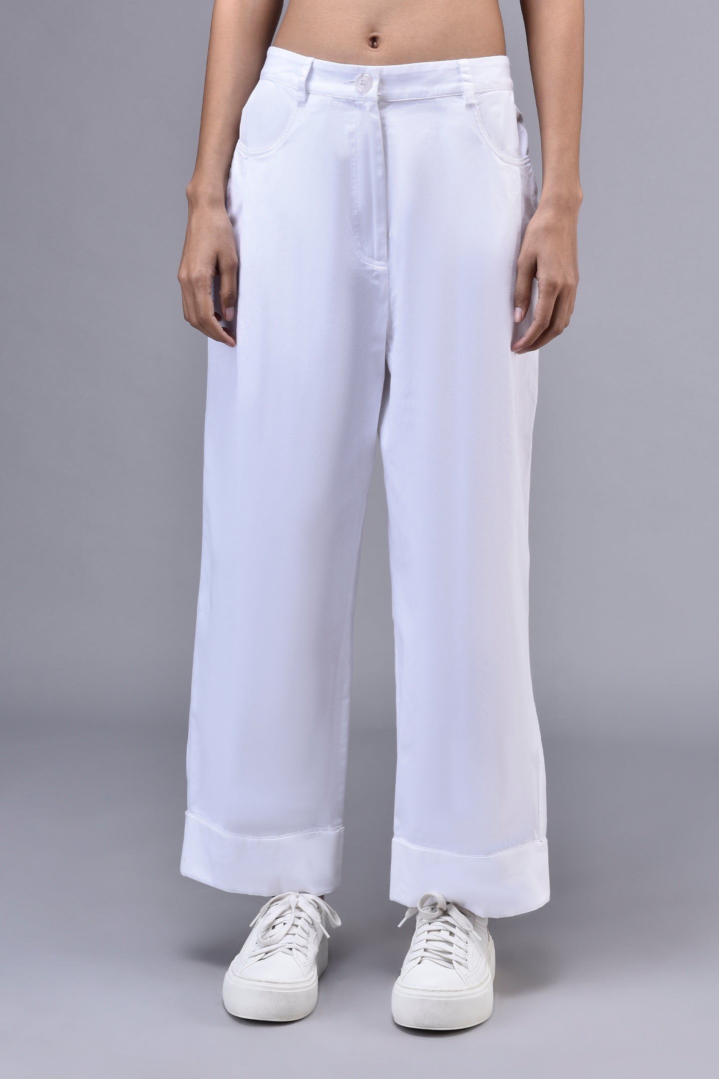 Stylera white cuffed wide leg trouser relaxed fit cotton pants for women styled with white sneakers