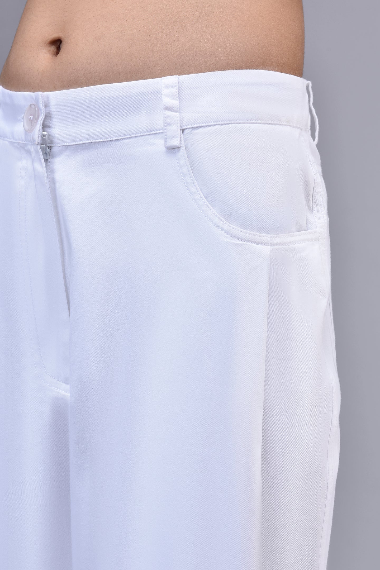 Stylera white trouser close up showing waist pocket belt loops and side seam relaxed fit cotton pants for women