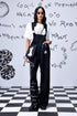 Stylera black printed relaxed fit dungaree for women styled with white tee and sunglasses