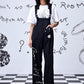 Stylera black relaxed fit dungaree for women styled with white graphic tee