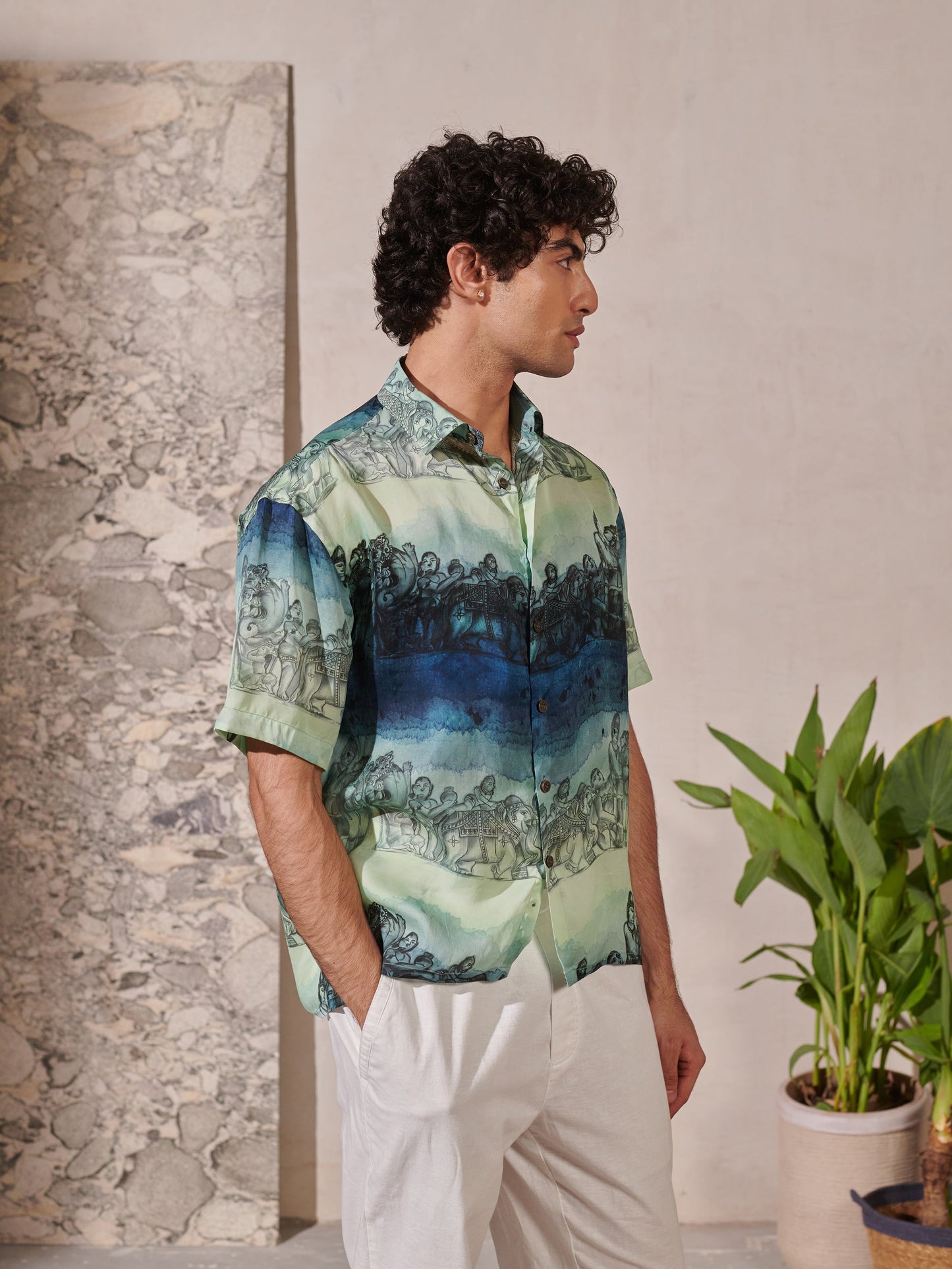 Relaxed fit short sleeve shirt for men in a blue and green abstract design, perfect for casual wear.
