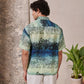 Back view of a Stylera relaxed fit short sleeve shirt for men in blue and green prints
