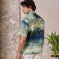 Back view of a Stylera's relaxed fit short sleeve shirt for men with artistic print and comfortable design
